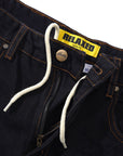 BUTTER relaxed denim jeans in washed black, full-length view with relaxed fit and classic five-pocket styling