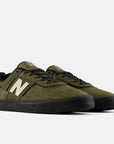 New Balance 306 Jamie Foy shoes in Dark Moss and Black with stylish design and durable construction.