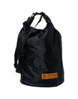 ANTI-HERO Hecho Por Skate dry bag in black with orange details and drawstring closure