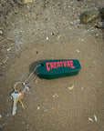 CREATURE KEYCHAIN LOST AT SEA DARK GREEN