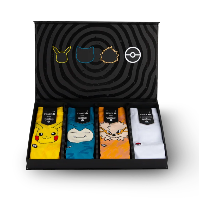 Stance Pokémon Trainer Crew Box Set socks with colorful character designs, assorted pairs shown on a white background