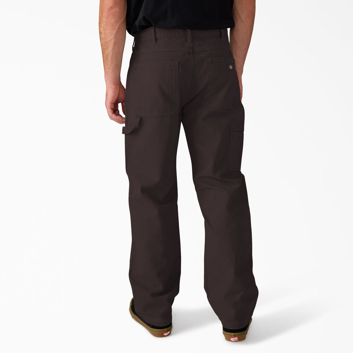 Dickies worn-in carpenter duck pants in dark brown, featuring durable fabric and classic workwear design.