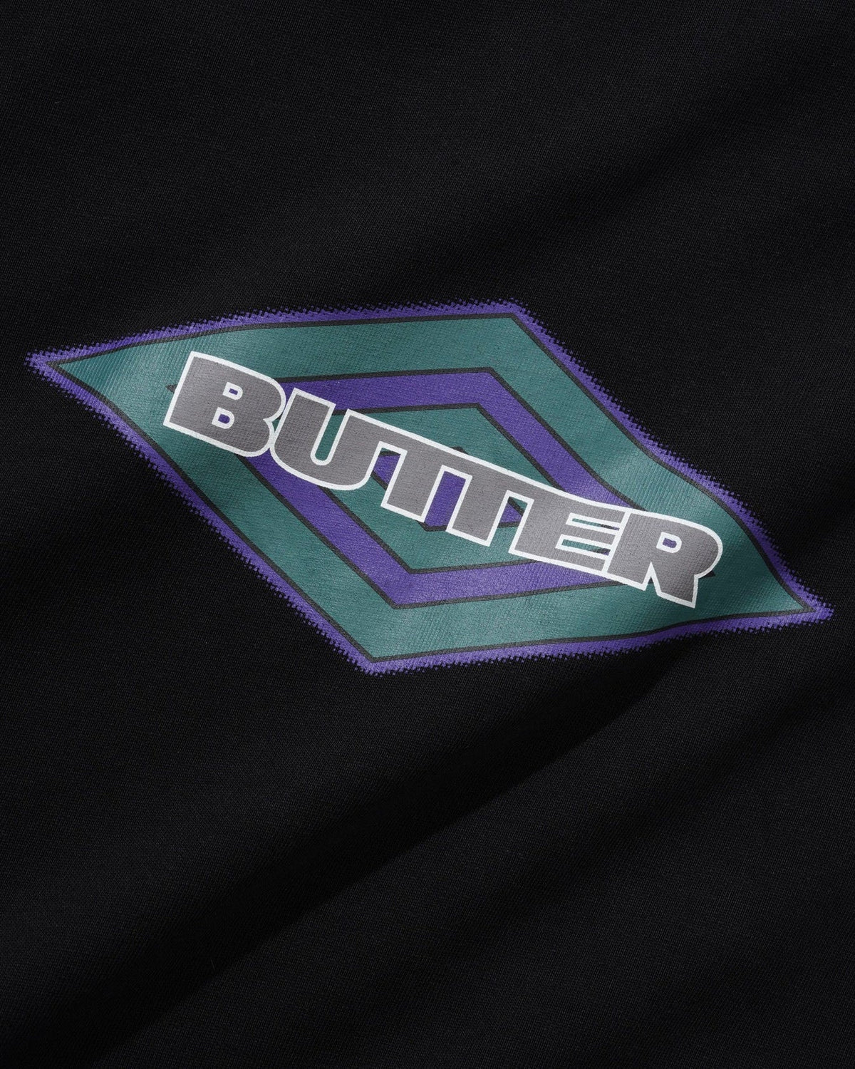 BUTTER black Diamond Logo T-shirt with white diamond graphic on front