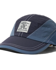 BUTTER Diamond Terrain Cap in navy and slate with structured crown and curved brim