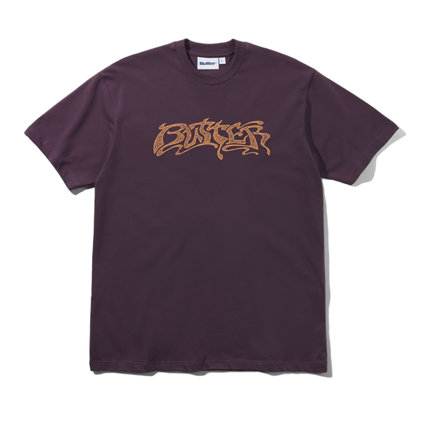BUTTER Drummer T-shirt in eggplant purple, featuring a drummer graphic on the front