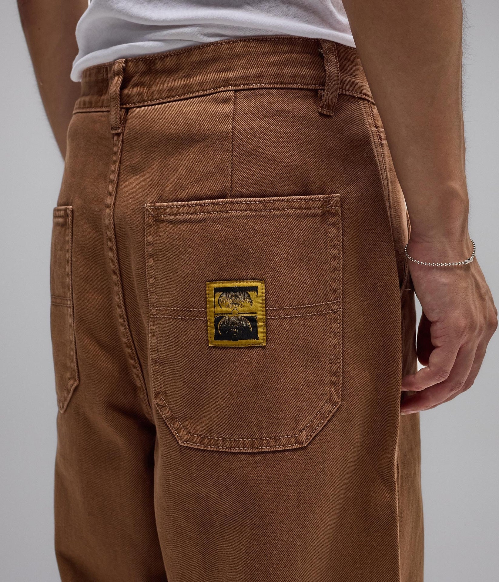 FORMER REYNOLDS OVERDYE DENIM PANT WASHED BROWN