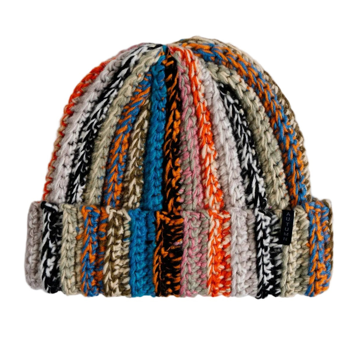 Autumn beanie patchwork teal headwear with mixed fabric patterns, stylish and cozy for autumn wear.