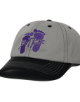 Butter Footprints 6 Panel Cap in grey with embroidered footprint logo and adjustable back strap