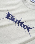 Butter Nail Logo T-shirt in ash gray with a nail logo graphic on the front