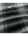 ROARK Nordsman 2.0 button-up shirt in dark slate, showing the front design and button closure