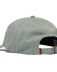 Butter Solar 6-panel cap in washed dull mint color, headwear with adjustable strap and panel design, casual and stylish.