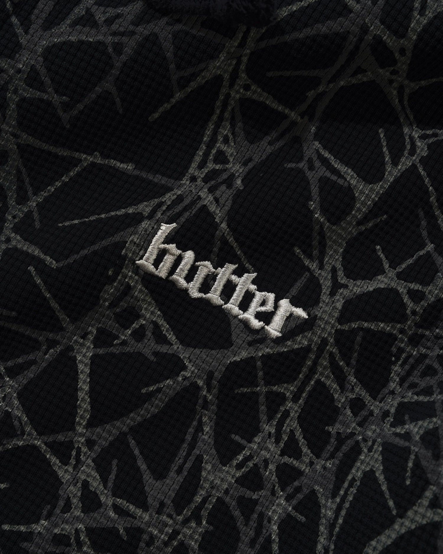BUTTER THORN CAMO WAFFLE ZIP THRU HOOD BLACK