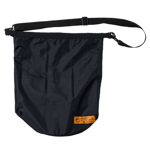 ANTIHERO Hecho Por Skate dry bag in black with orange details, flat product view