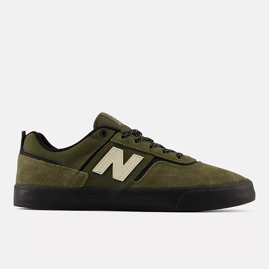 New Balance 306 Jamie Foy shoes in dark moss and black with a sleek design and sporty silhouette.