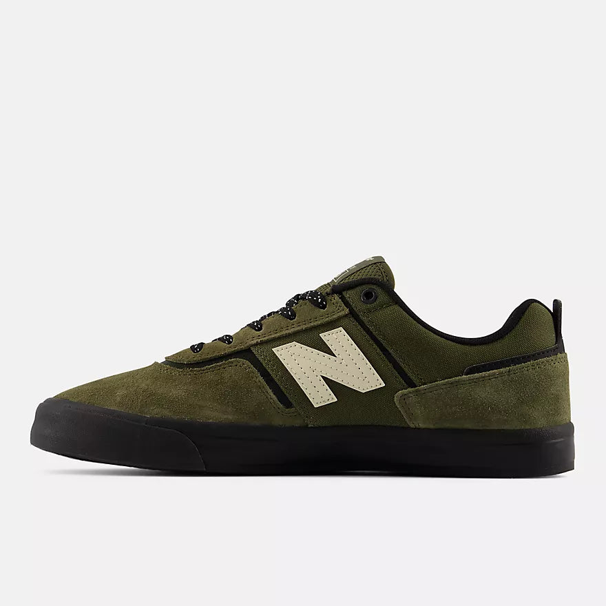 New Balance 306 Jamie Foy shoes in dark moss and black color, featuring a sleek athletic design and durable construction.