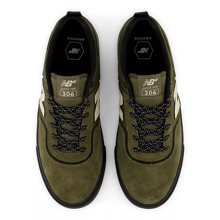 New Balance 306 Jamie Foy shoes in Dark Moss and Black with sporty design and cushioned sole, ideal for skateboarding.