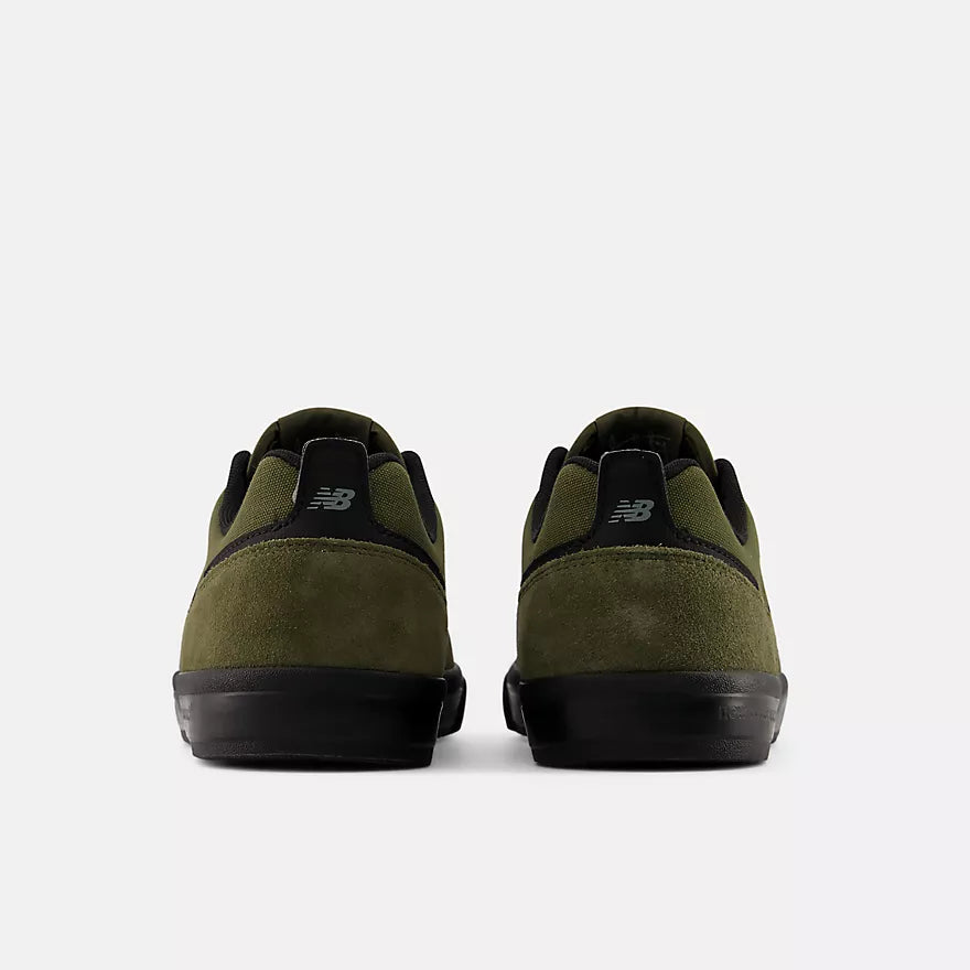 New Balance 306 Jamie Foy dark moss and black shoes, featuring stylish design and durable construction.